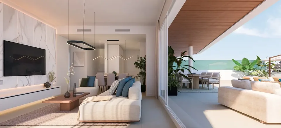 Obývací pokoj apartmánu s otevřenou terasou a výhledem na moře